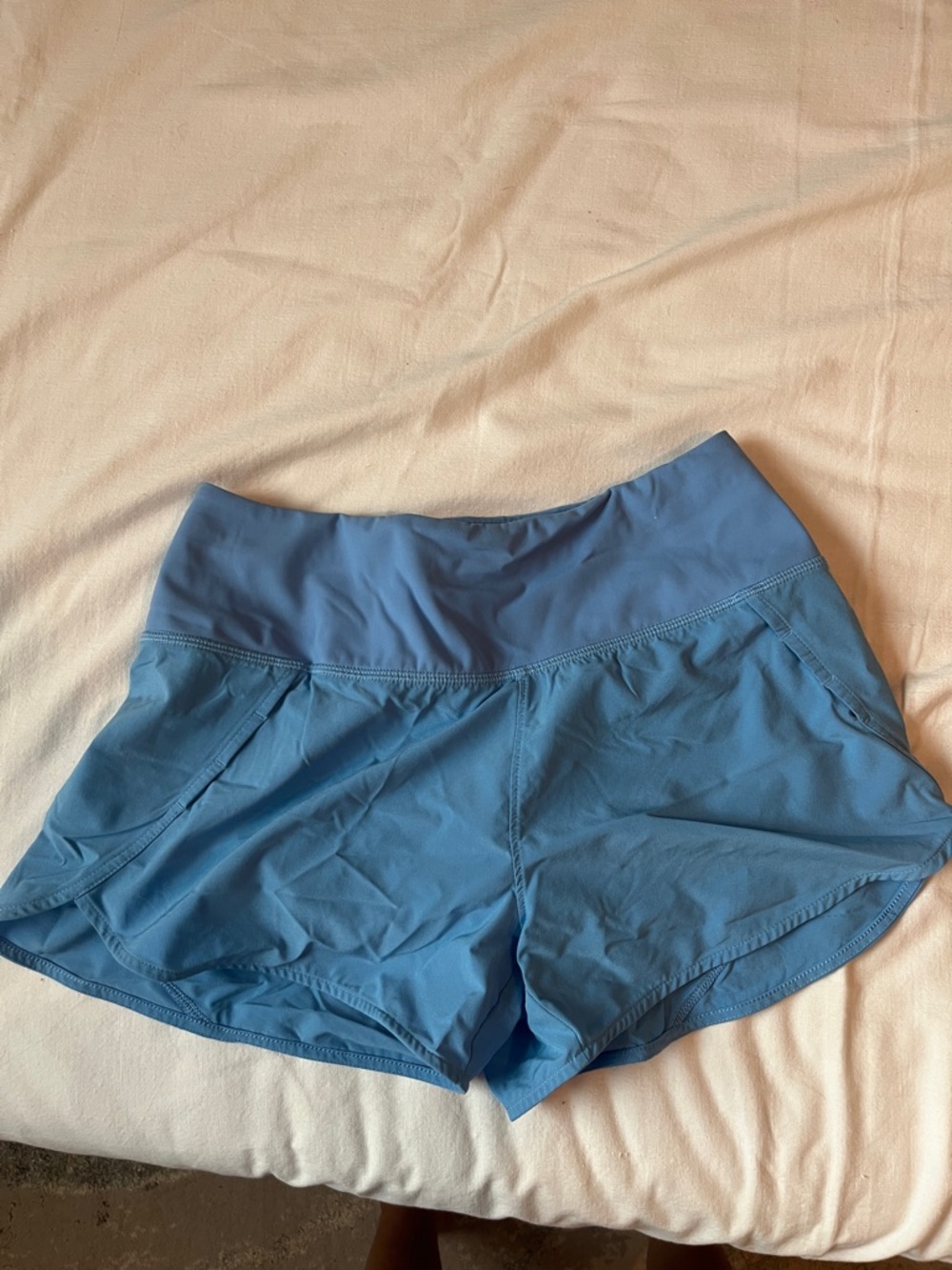 Aritzia TNAaction blue athletic shorts